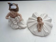 A Nao figure of a ballerina and further figure of a baby in dress