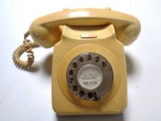 A cream Bakelite cased telephone