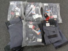 A box of six pairs of DIckies work trousers,