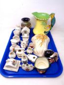 A tray of crested china together with a Crown Ducal china wall pocket, two miniature character jugs,
