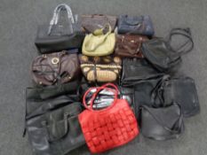 Two boxes of assorted hand bags and purses including Fiorelli