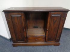 A Jaycee furniture carved oak media storage unit