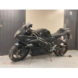 A Suzuki GSXR1000 motorbike, K5, colour black, registration K100 0SE, first registered 19/5/2005.