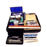 A tray of rulers, hip flask, Colibri lighter, boxed cutlery,