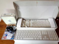 Apple A1103 mini power unit. Together with two boxed Apple keyboards, pair of headphones etc.