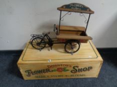 A hand painted Flower Shop display box with miniature three wheel delivery bike