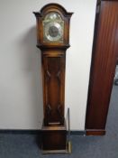 A 20th century oak Tempus Fugit granddaughter clock