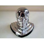 A reproduction Indian Head chromed car mascot