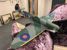 A large model spitfire with engine