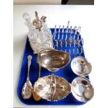 A tray of silver plated wares to include cruet set on stand, berry spoons, swing handled bowls,