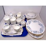 Thirty-five pieces of Royal Albert Silver Maple bone china tea and dinner ware.