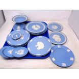 A tray of Wedgwood blue and white Jasperware commemorative plates,