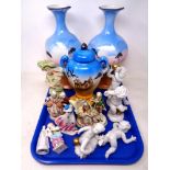 A tray of three piece pottery garniture set,