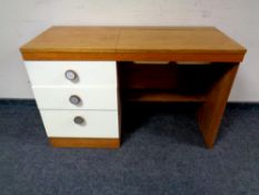 A 20th century teak two tone dressing table