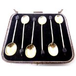 A cased set of six silver gilt coffee spoons