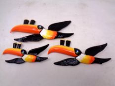 A graduated set of three Guinness style Toucans