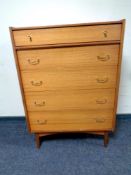 A 20th century Golden Key Furniture teak five drawer chest