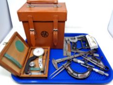 A tray of precision gauges, folding knife, multi tool,