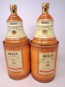 Two Bells Old Scotch Whisky decanters, each sealed in boxes.