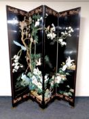 A Japanese style four fold lacquered screen / room divider