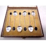 A cased set of six silver coffee spoons