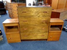 A mid century plywood and melamine four drawer chest together with a pair of bedside pot cupboards