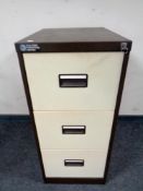 A BFC three drawer metal filing cabinet with key
