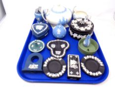 A tray of Wedgwood Jasperware in various colours including table lighter, lidded trinket pots,