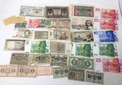 A quantity of world banknotes, as illustrated.