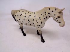 A Beswick Appaloosa (spotted walking pony), model no. 1516, designed by Arthur Gredington, 13.
