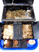 A tray of two vintage metal cash tins containing a large quantity of British copper coins etc