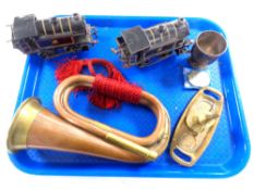 A tray of two tin plated locomotives, copper and brass bugle, plated mug,