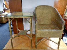 A mid century Lloyd loom occasional table and basket chair