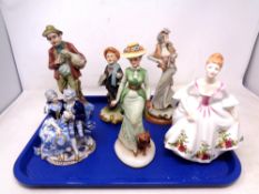 A tray of figurines including Royal Doulton Country Rose HN 3271,