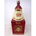 A Bells Extra Special Old Scotch Whisky decanter - Christmas 1996, sealed in box.
