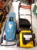 A Makita Umo 1D lawn mower with grass box together with a Gmelr electric rotavator with box