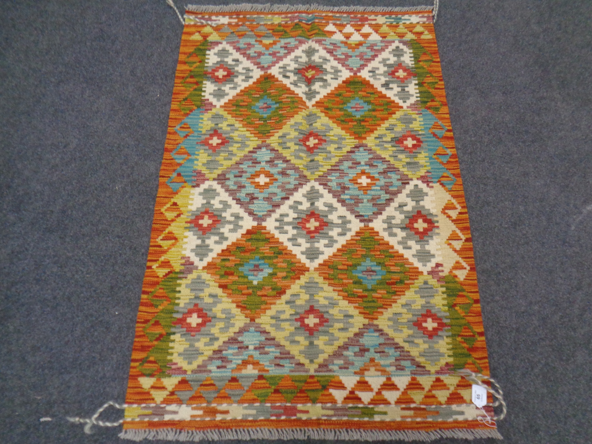 A Chobi kilim 126cm by 84cm