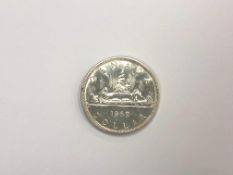 A Canadian silver dollar 1962