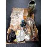 A box of drinking glasses, glass paperweight and ornaments,