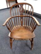 A 19th century elm and beech stick backed Windsor armchair