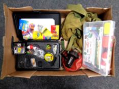 A box of fishing equipment, Daiwa 7500 reel, trout accessories box.