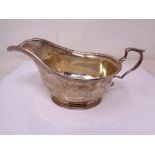 A silver sauce boat, Birmingham marks.