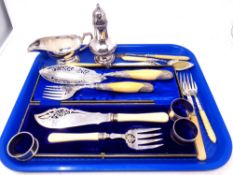A tray of silver plated fish knives and forks, sifter, sauce boat,