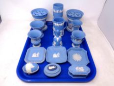 A tray of Wedgwood blue and white Jasperware including pair of flower vases, hand bell, dish,