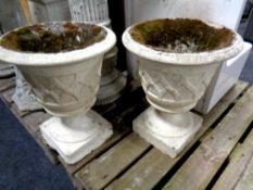 A pair of classical concrete garden planters