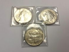 Three silver USA dollars 1922, 1923,