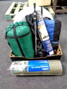 A box of camping equipment, pop-up tent, sleeping bag, walking poles, camping mat,