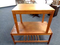 A 20th century teak rectangular coffee table together with further occasional table