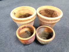 Two pairs of terracotta plant pots