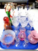 A tray of glass ware including Stuart crystal wine glasses, Italian glass fish ornament,